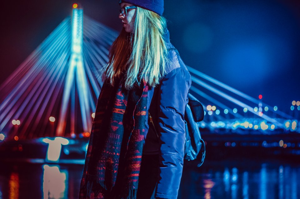 Woman Wearing Blue And Red Leather Jacket