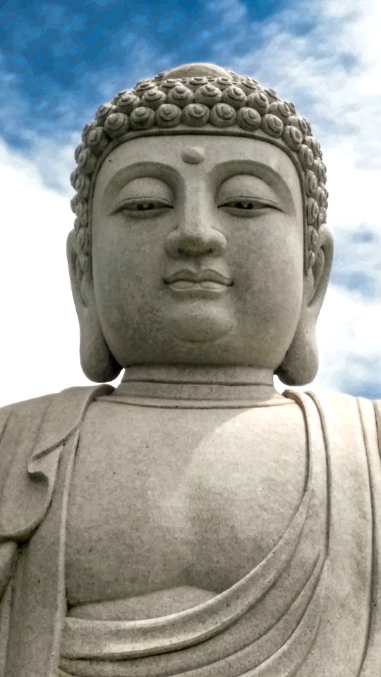 Buddha Statue Under White Clouds