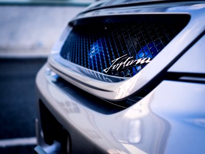 Shallow Focus Photography Of Cars Front Grill photo