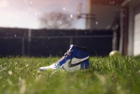 Selective Focus Photography Of Air Jordan 1 photo