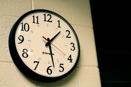 Round Black Analog Wall Clock photo