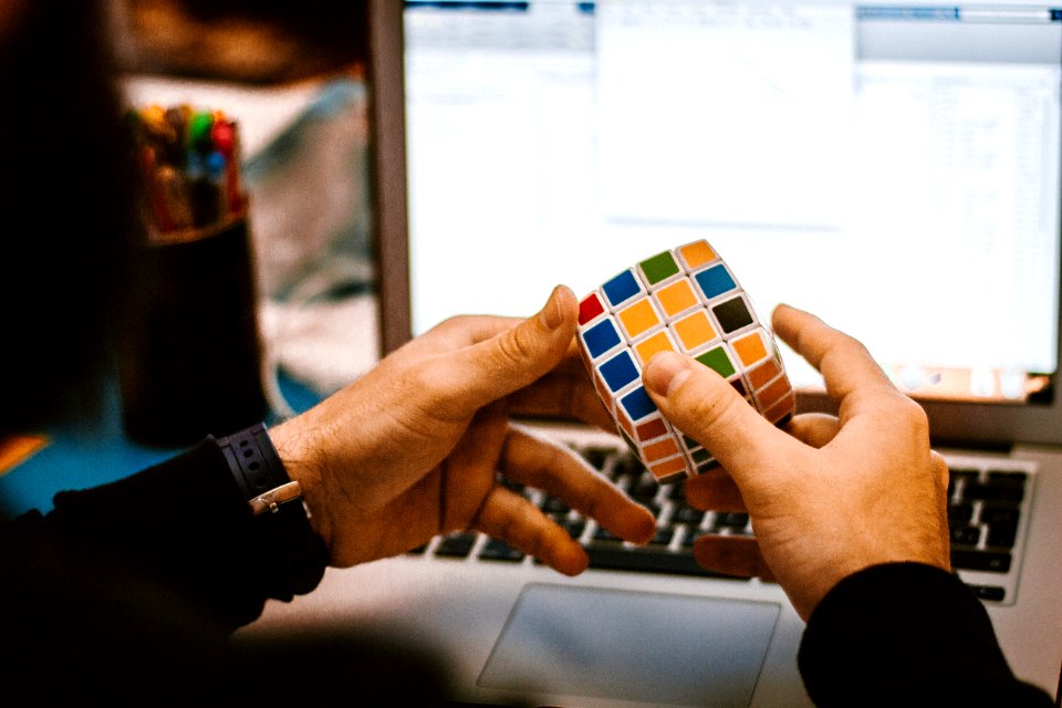 4x4 Rubiks Cube On A Mans Hand