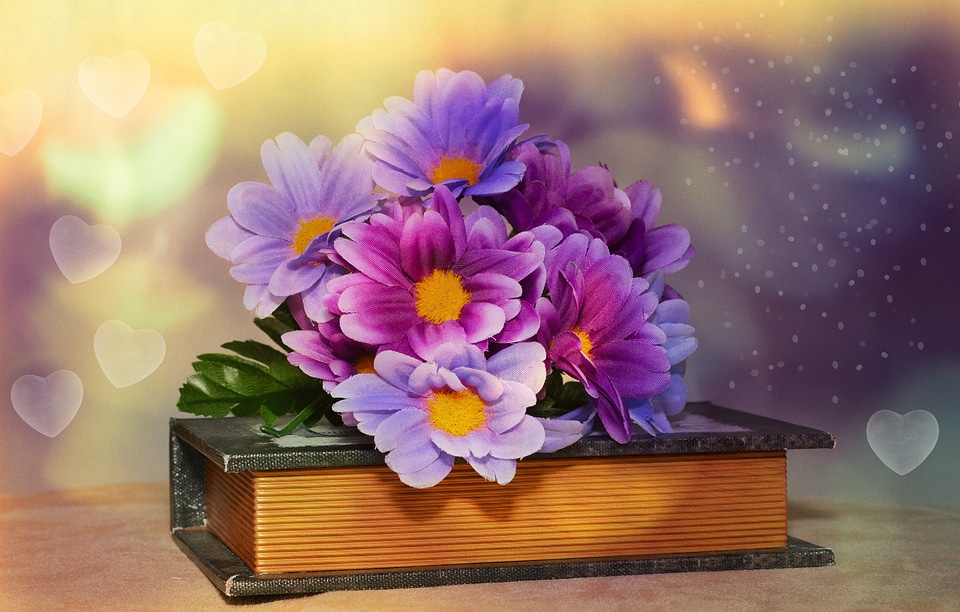 Artificial flowers book bokeh