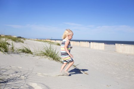 Photography Of A Child On Beach