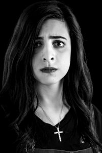 Monochrome Photography Of Woman Wearing Cross Necklace
