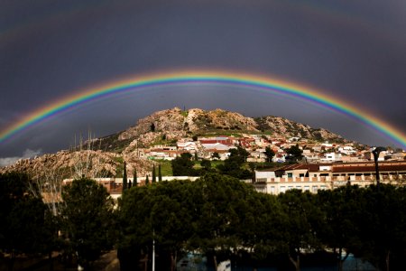Landscape Photo Of The View Of City With Rainbow Above