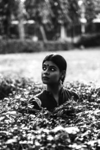 Grayscale Photography Of Woman On Garden photo