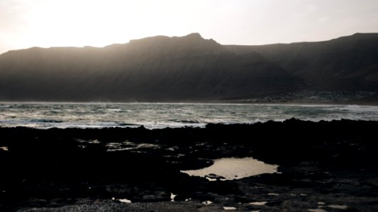 Silhouette Of Mountain At Golden Hour photo