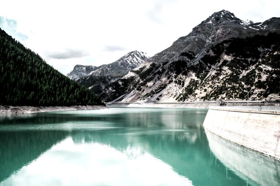 Landscape Photography Of Body Of Water Near Mountain