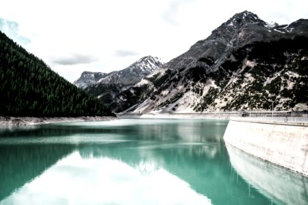 Landscape Photography Of Body Of Water Near Mountain photo