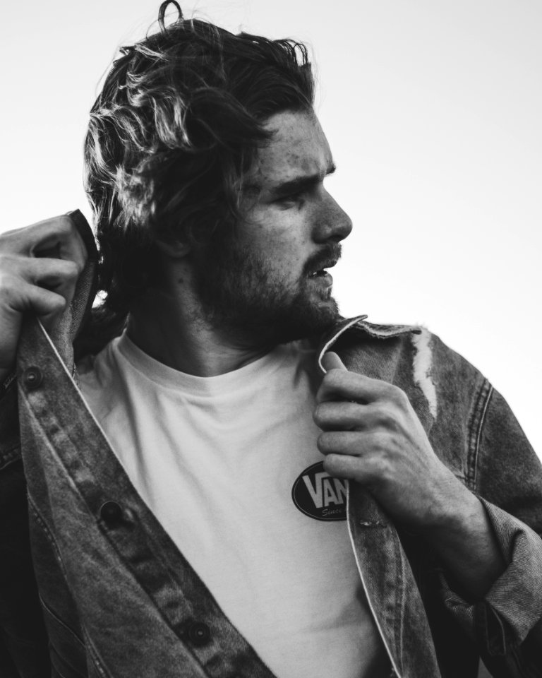 Greyscale Photography Of Man Wearing Jacket