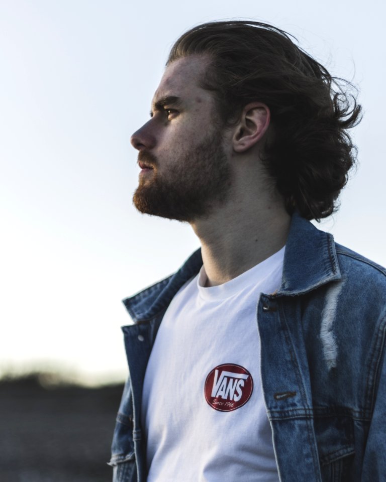 Man Wearing White Crew-neck Vans Top And Blue Denim Button-up Jacket