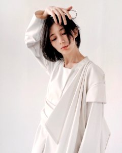 Woman In White Long-sleeved Dress photo