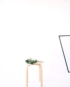 Green Leaves On Round Beige Wooden Stool Chair