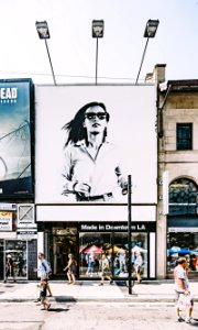 Photo Of Billboard Of Woman In Black And White photo