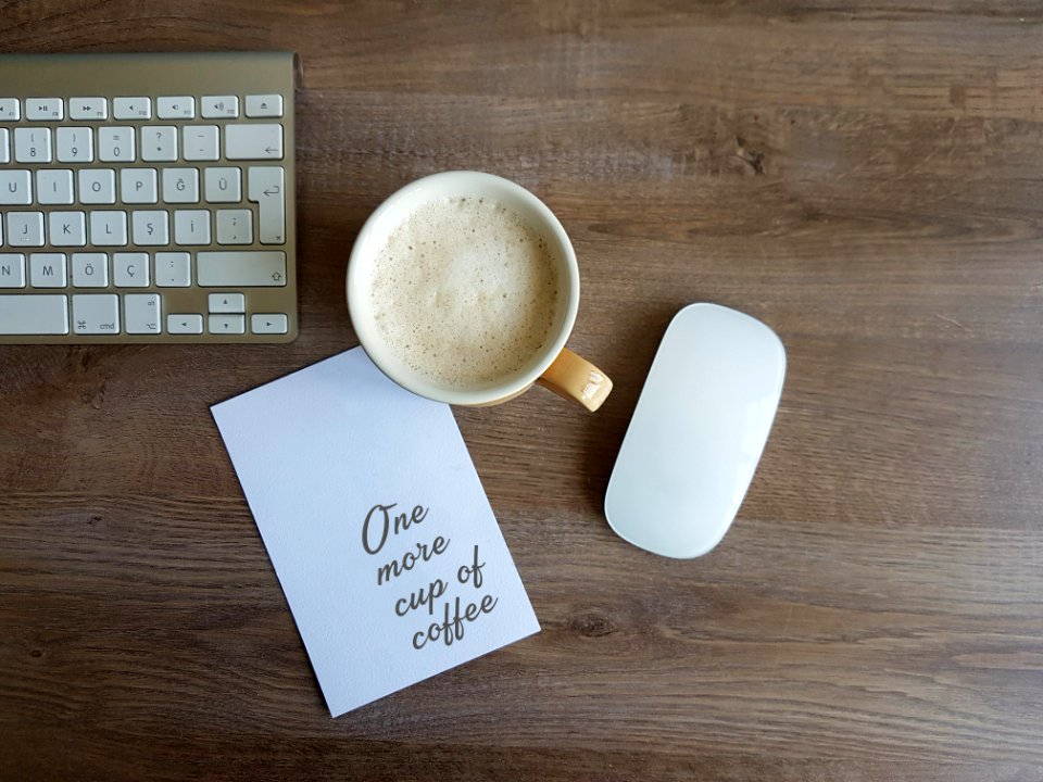 Apple Magic Mouse And White Ceramic Mug photo