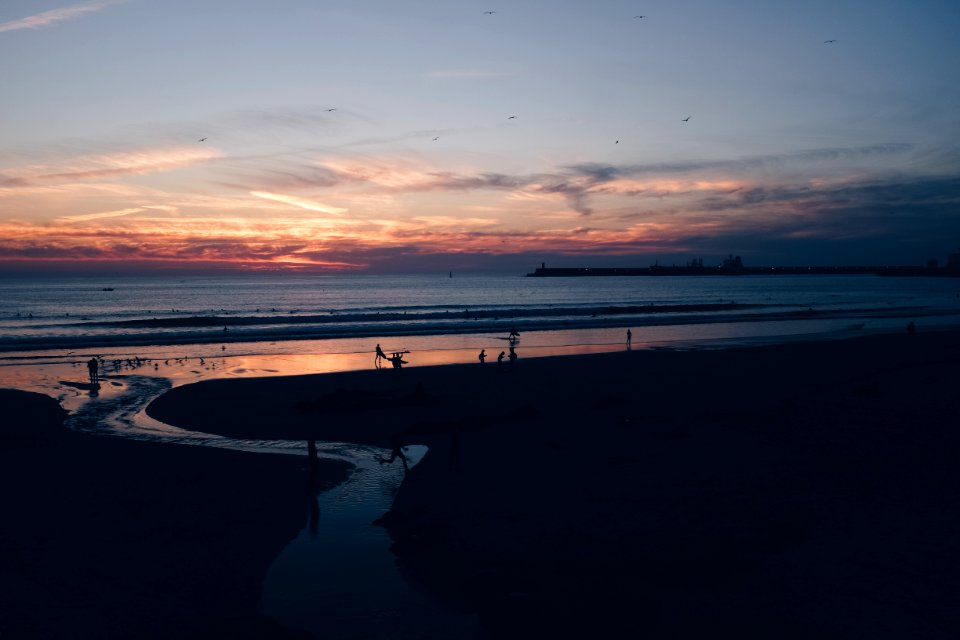 Silhouette Photo Of Sea During Golden Hour
