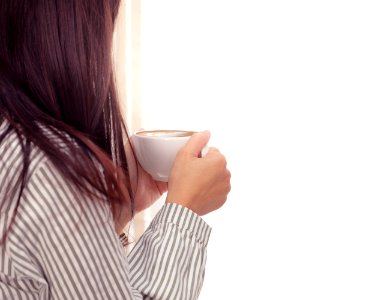 Photo Of Woman Holding Cup Of Coffee photo