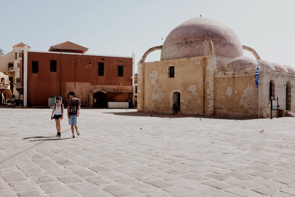 Couples Walking In Front Of Dome Building