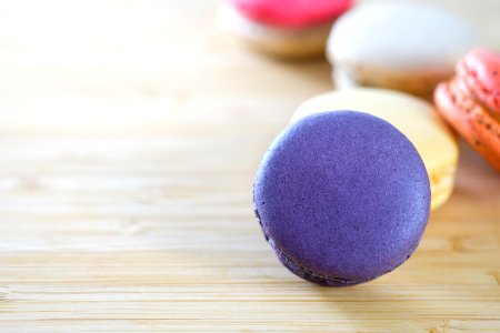 Photo Of Macarons On Brown Wooden Surface