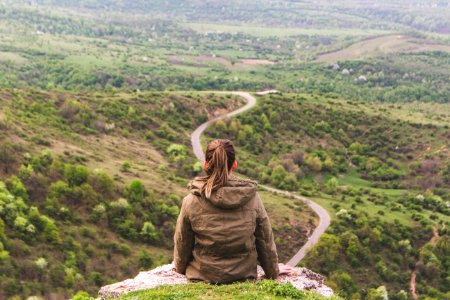 Woman In Brown Hoodie photo