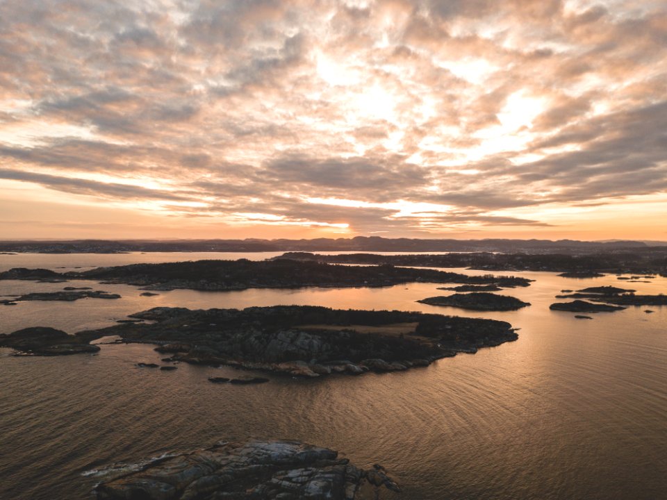 Aerial Photography Of Mountains Near Body Of Water