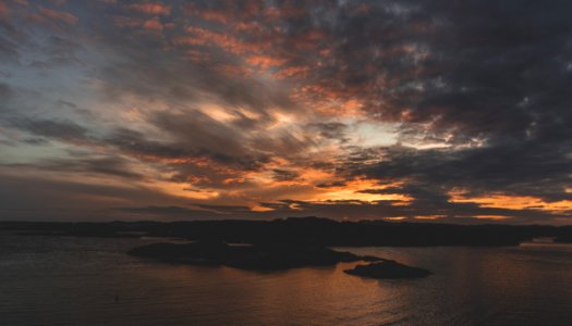 Silhouette Of Island During Sunset photo