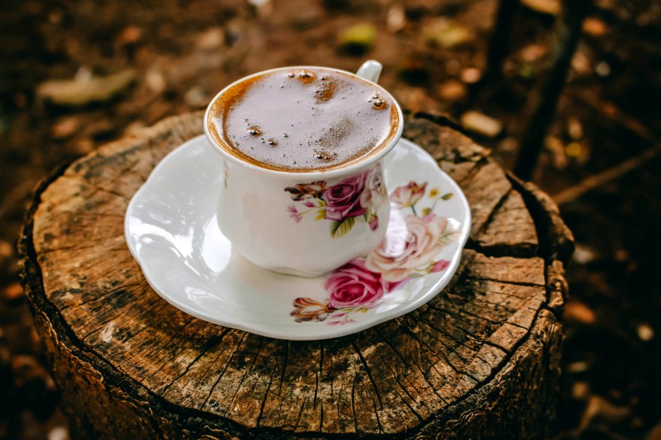 Close-UP Photography Of Coffee On Tree Stump