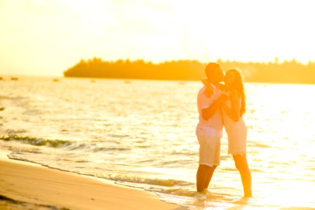 Hugging Woman And Man In Beach photo