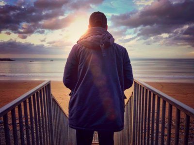 Man Standing On Stairs photo