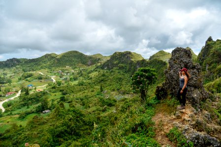 Woman Standing On Rock Formation photo