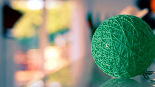 Close-Up Photography Of Green Yarn photo