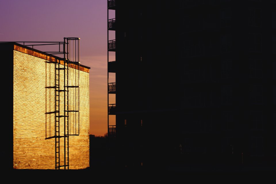 Silhouette Of Building During Golden House Photo