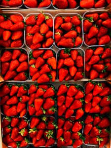 Top View Photography Of Strawberries On Containers