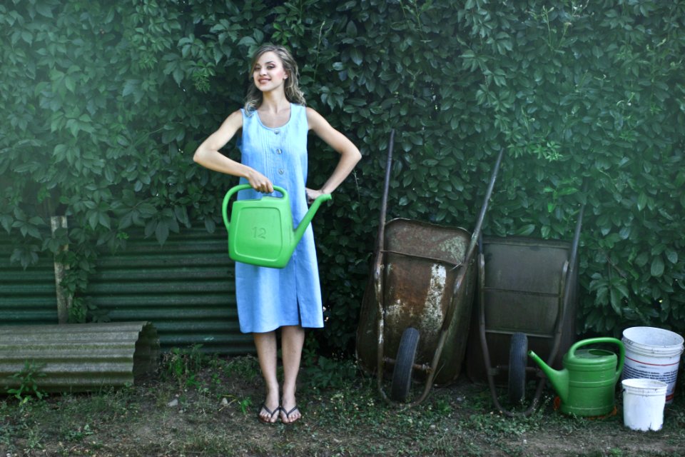 Photo Of Woman Holding Watering Can