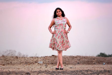 Photography Of A Woman Wearing Pink And White Dress photo