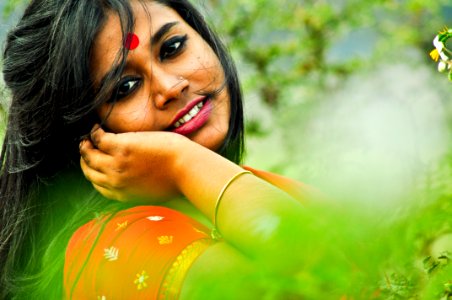 Close-Up Photography Of A Smiling Girl photo