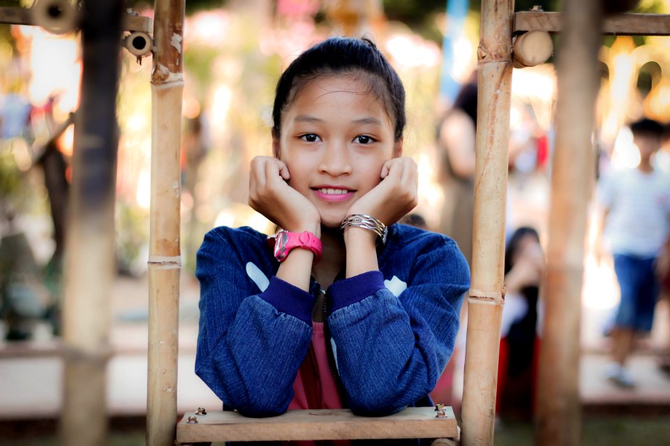 Girl Resting Her Hand And Wearing Pink Watch