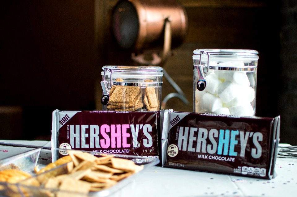Close-up Photo Of Hersheys Bars Near Jars