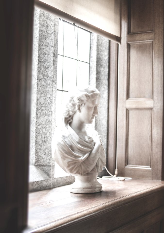 Photo Of Sculpture Near Window
