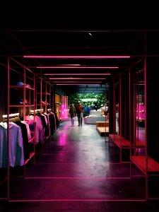 Group Of People Standing In Store photo