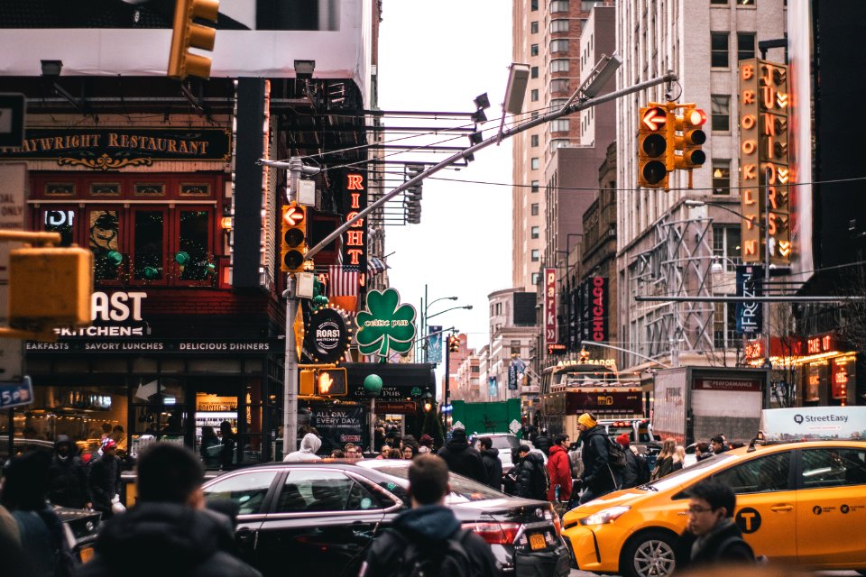 Group Of People Walking On Street