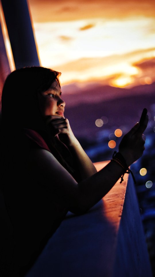 Woman In Red Shirt Facing On Her Phone