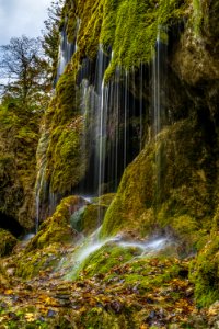 Waterfalls On Mountain Cliff photo