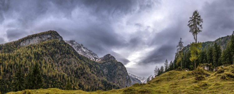 Landscape Photography Of Mountains Under Gray Cloudy Sky photo