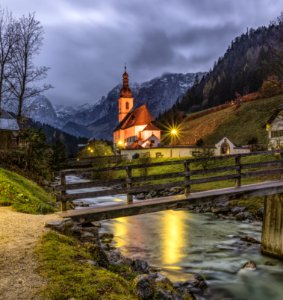 Brown And Beige House With Background Of Mountain photo