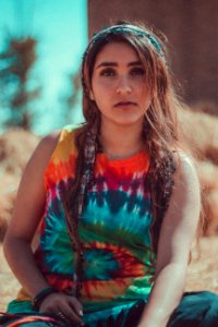 Woman In Red Blue And Orange Tie Dye Tank Top Macro Shot