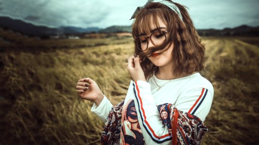 Photo Of Woman Sniffing Hair