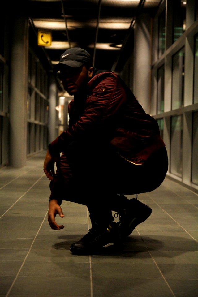 Man Wearing Brown Jacket