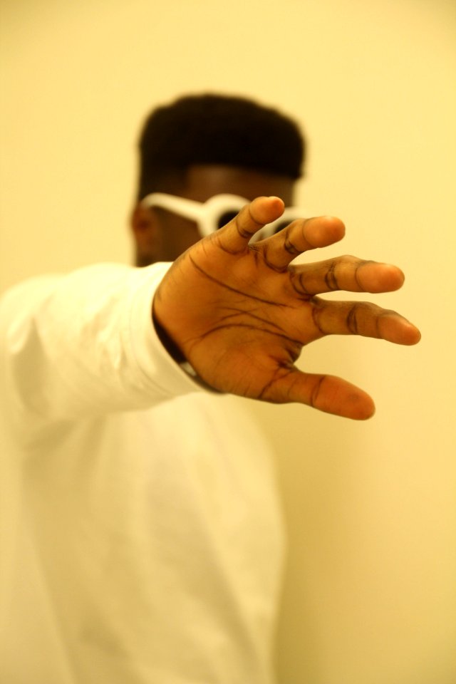 Man In White Long-sleeved Shirt Wearing White Sunglasses photo